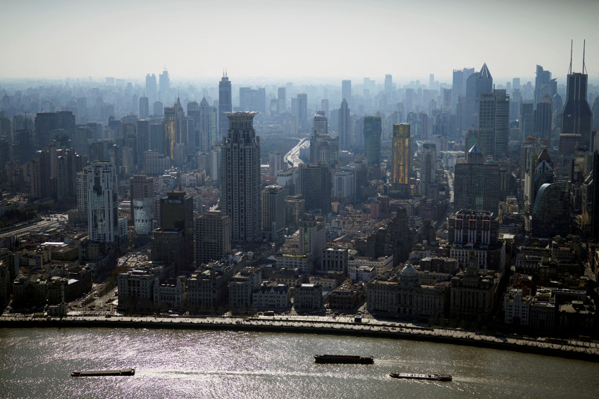 FILE PHOTO: View of the city skyline and Huangpu river in Shanghai